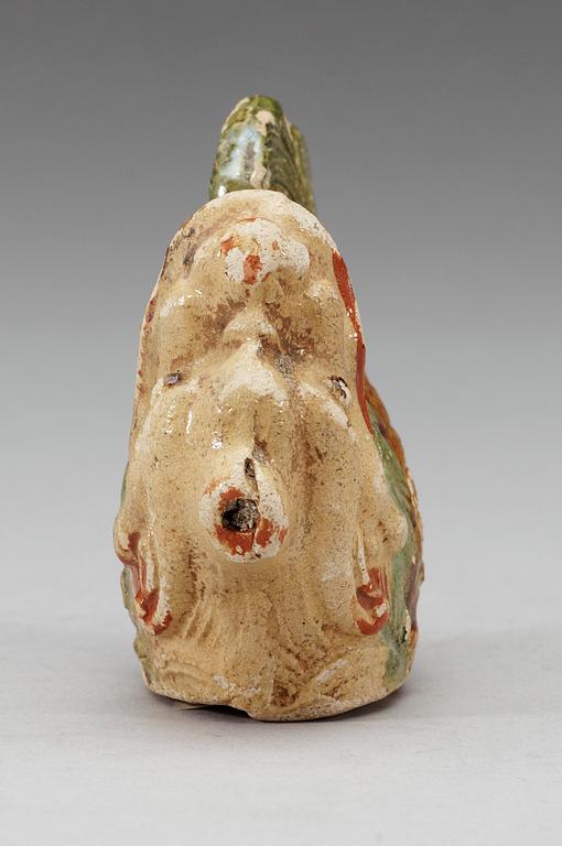 A glazed pottery dragon-carp water dropper, Qing dynasty, Jiaqing, circa 1816.