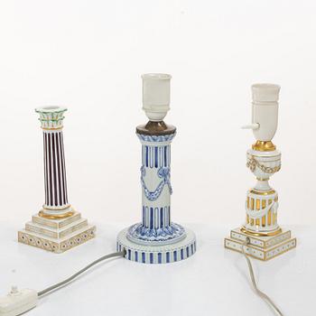 Royal Copenhagen, Two table lamps and a candlestick, Denmark, late 19th–early 20th century.