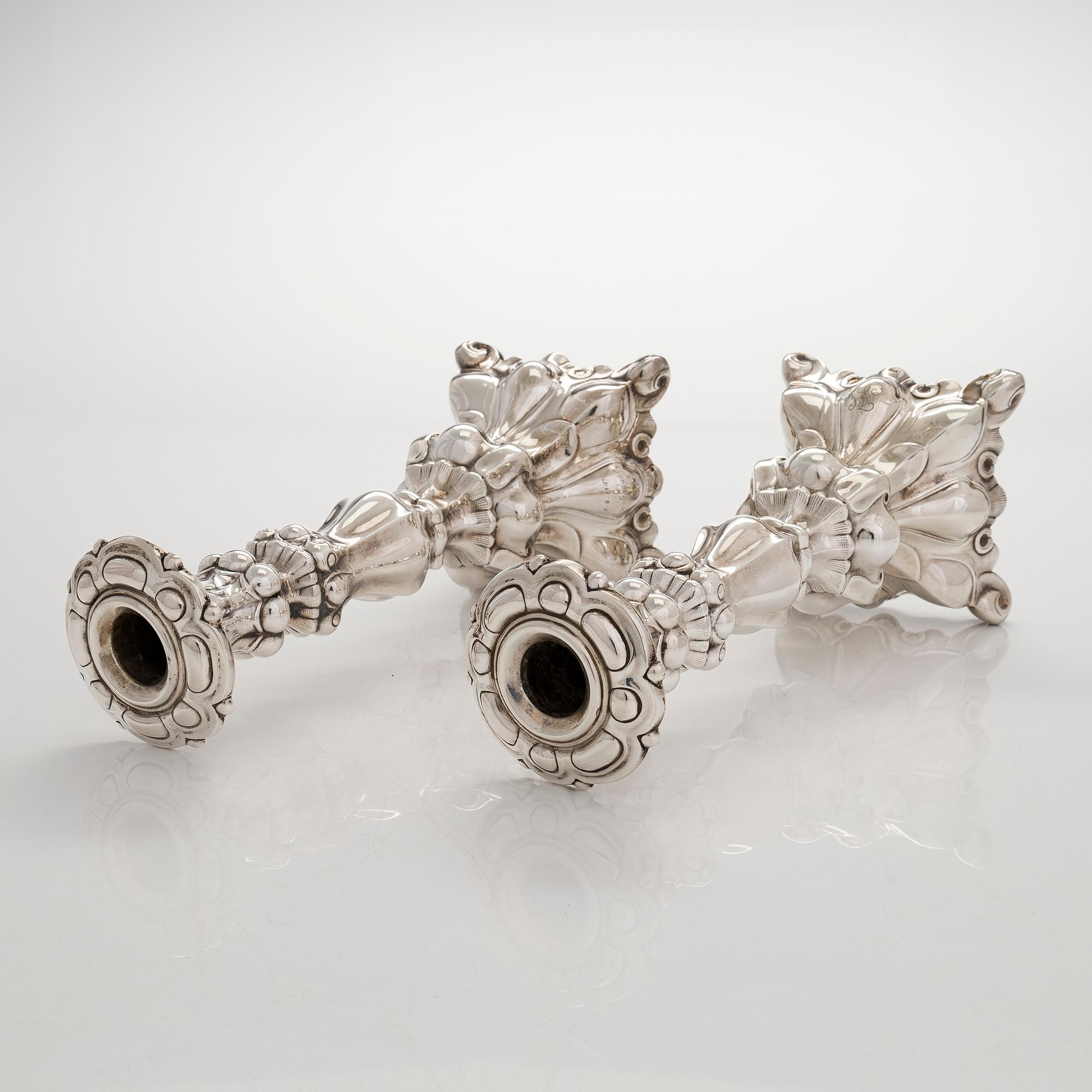 A pair of baroque style silver candlesticks, Hopeatehdas Oy, Helsinki 1947.