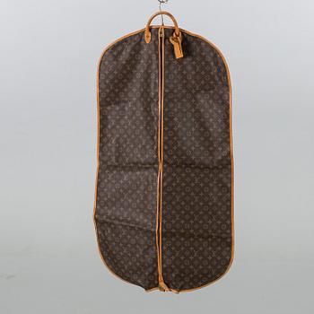 A LOUIS VUITTON GARMENT COVER.