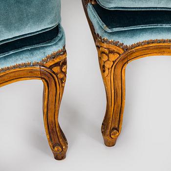 A pair of Louis XV style armchairs, mid-20th century.