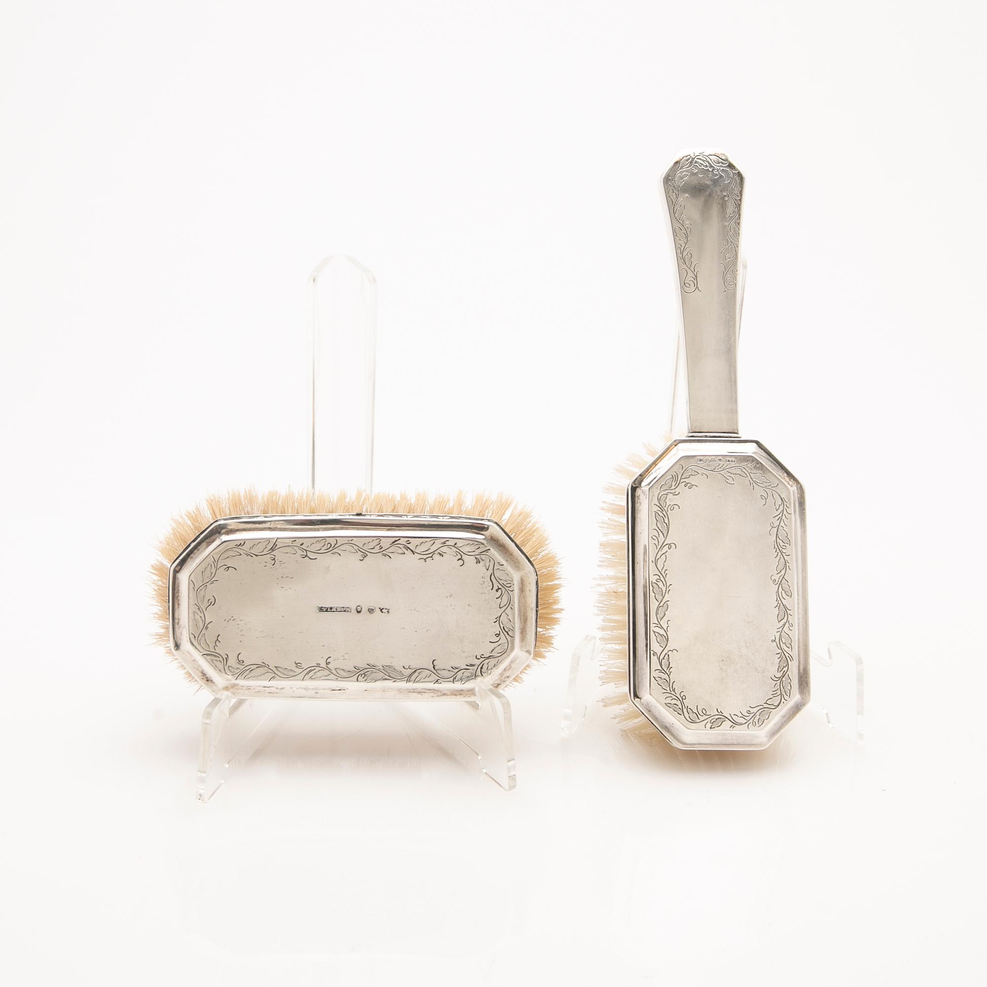 Toilet set, 4 pieces, silver, including one by Carl Petter Lampa, Stockholm 1828. The others mid-20th century.