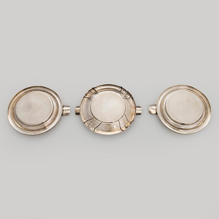 A silver cigarette case, matchbox holder and small bowl, Sandrik, as well as 3 ashtrays, Czechoslovakia 1929-1945.