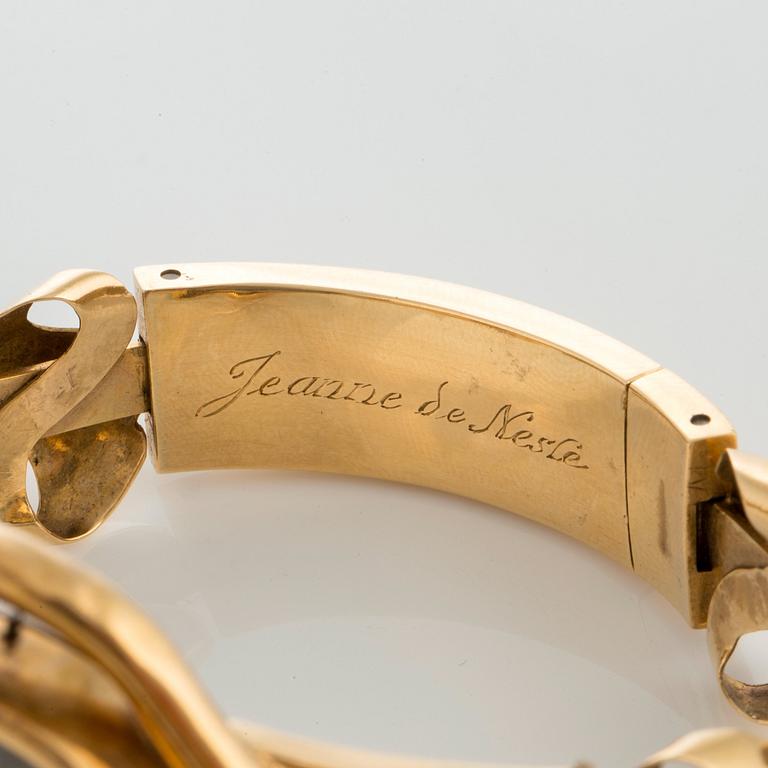 An 18K gold bracelet with an 18th century miniature portrait of Jeanne de Nesle, according to engraving.