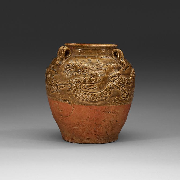 A partially glazed pottery vase, Ming Dynasty (1368-1643).