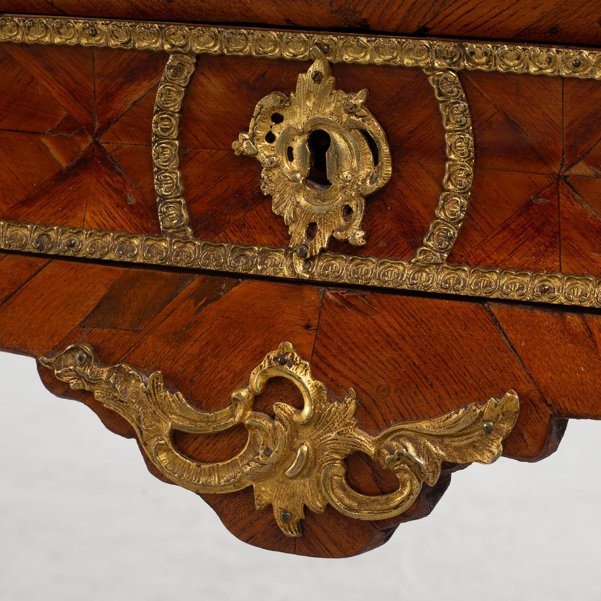 A rococo rosewood parquetry and gilt-brass mounted secretaire by J. H. Reimers (master in Stockholm 1754-73).