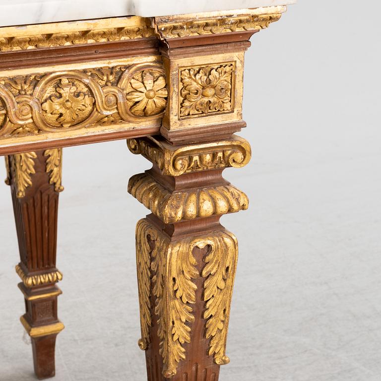 A Louis XVI-style table, France, 19th Century.