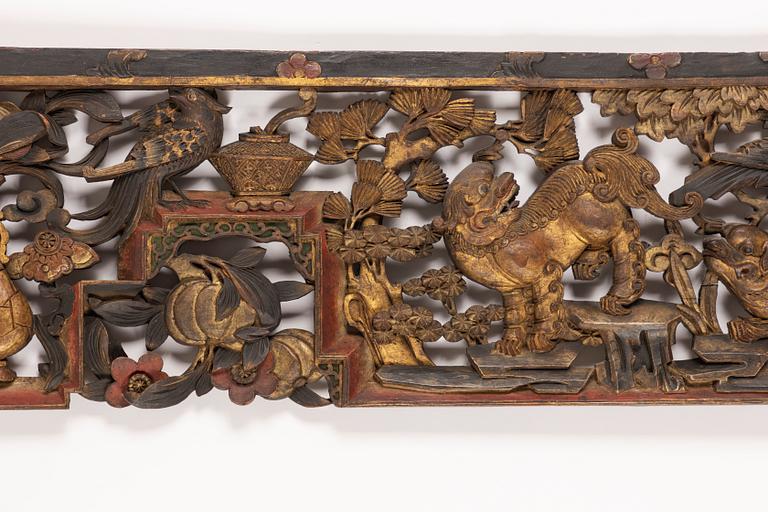 A Chinese carved wood panel, 19th Century.