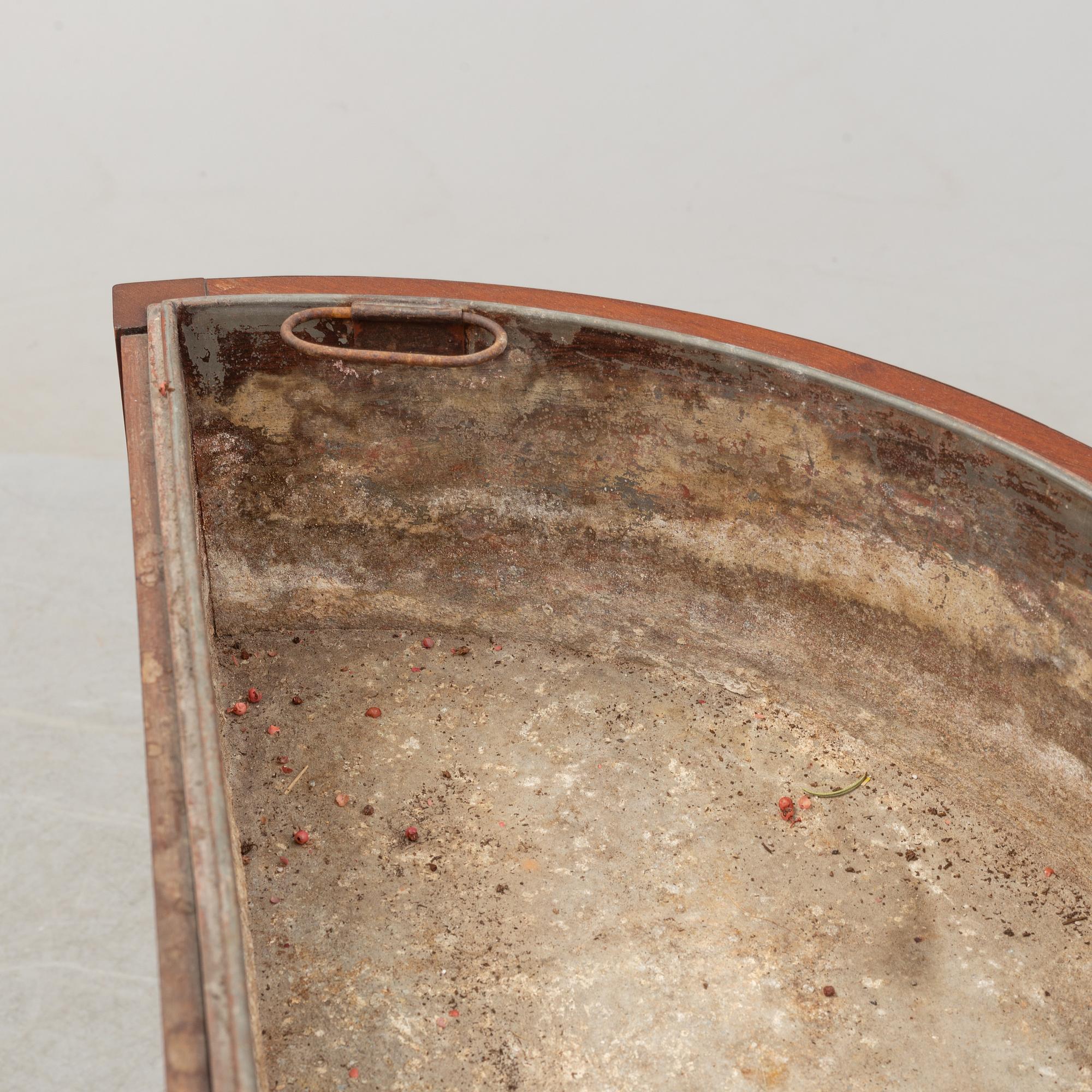 A late 19th century mahogany flower table.