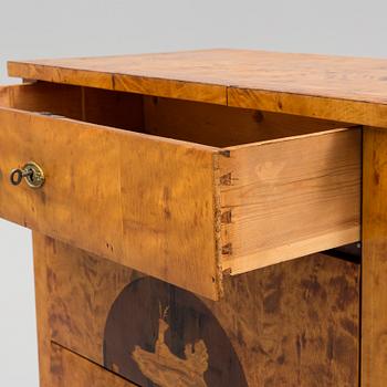 A mid 19th century chest of three drawers.