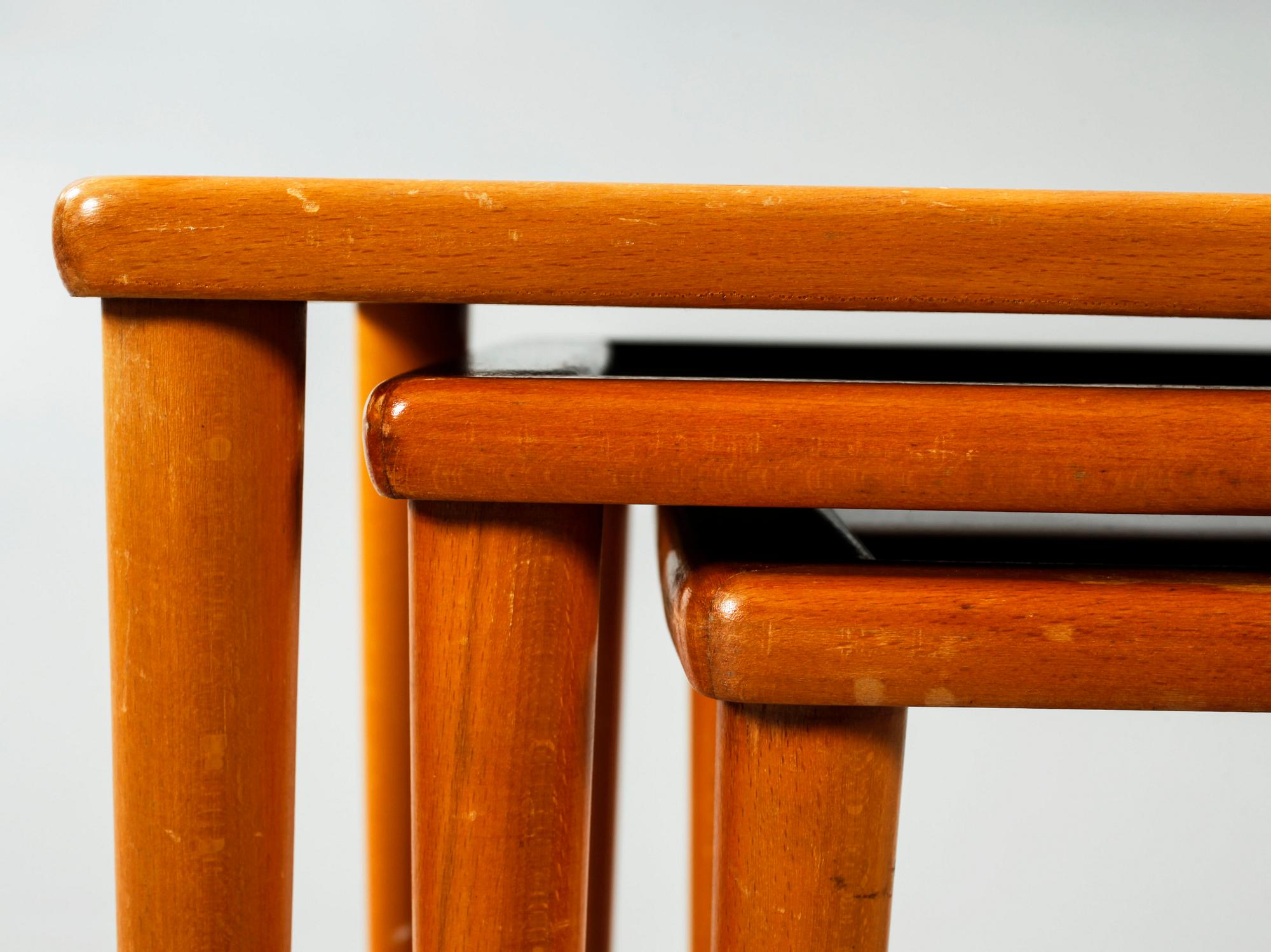 An nest of table of three pieces from the second half of the 20th century.