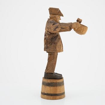 Axel Petersson Döderhultarn, skulptur, signerad. Delvis bemålat trä, höjd 34 cm.