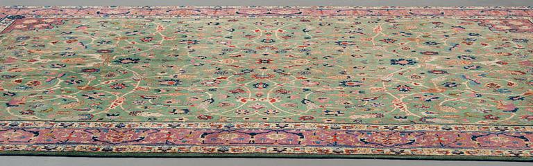 A carpet, a semi-antique Tabriz, ca 374-376,5 x 268-276 cm.