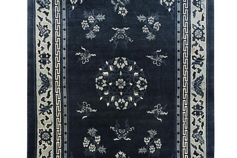 A carpet, China, Antique Finish, ca 250 x 152 cm.
