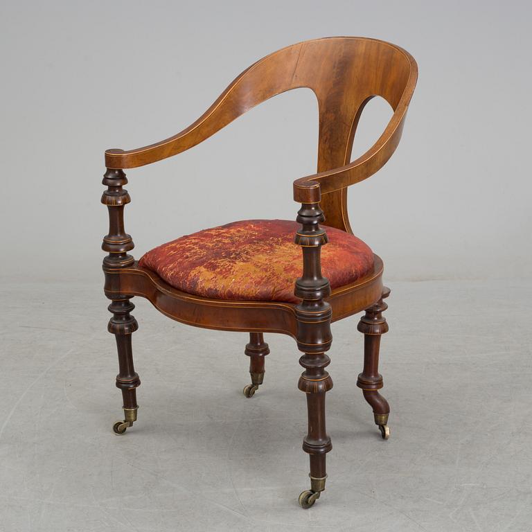 A mid 19th century writing desk and chair.