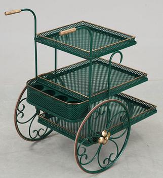 A 1940's-50's, green lacquered metal and brass serving trolley, 1940's-50's.