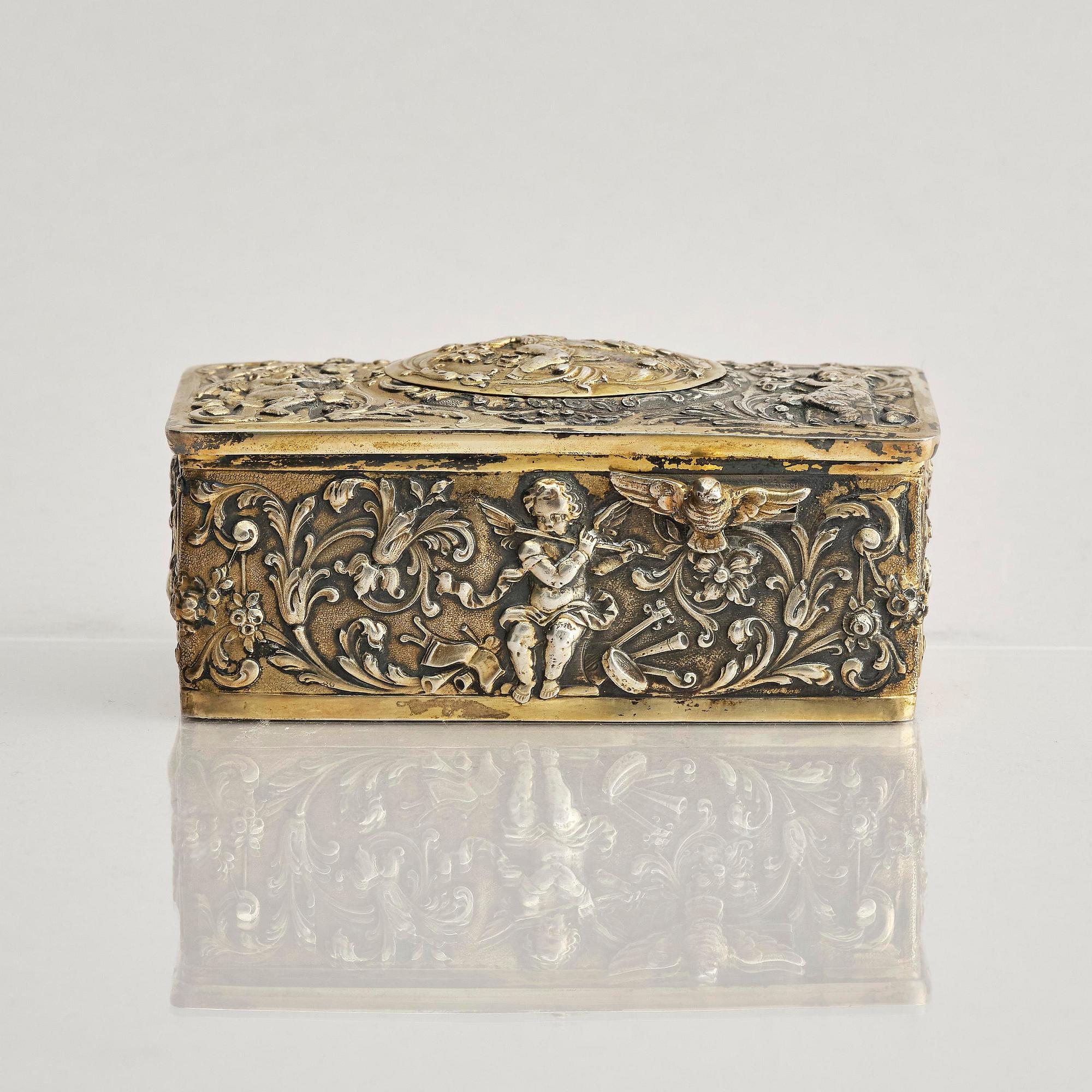 Music box. gilded 800 silver. Germany, late 19th/early 20th century.