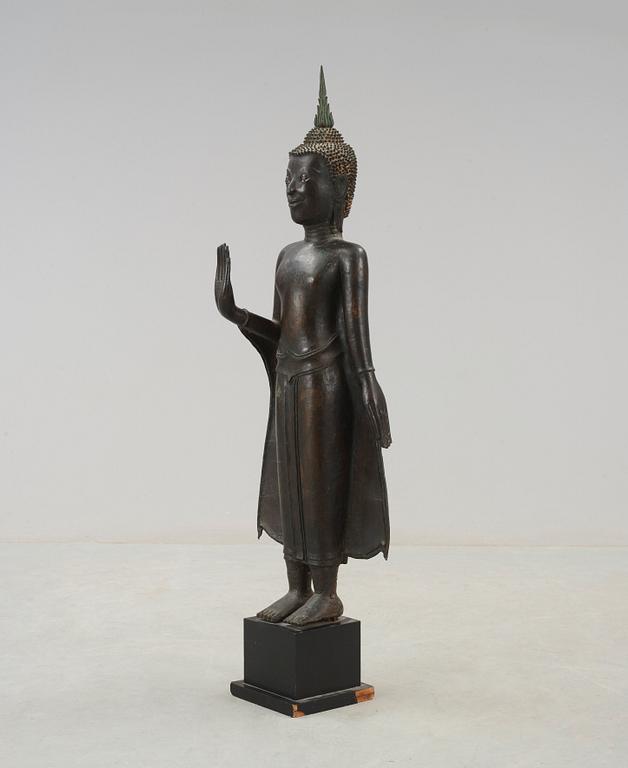 A standing bronze figure, Thailand 18th Century.