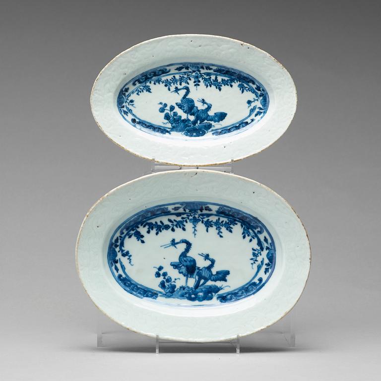 A pair of blue and white armorial dishes, Qingdynasty, Qianlong (1736-95).