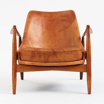 Ib Kofod-Larsen, a teak and cognac coloured leather 'Sälen' easy chair, Olof Perssons Fåtöljindustri (OPE), Sweden, 1950-60s.