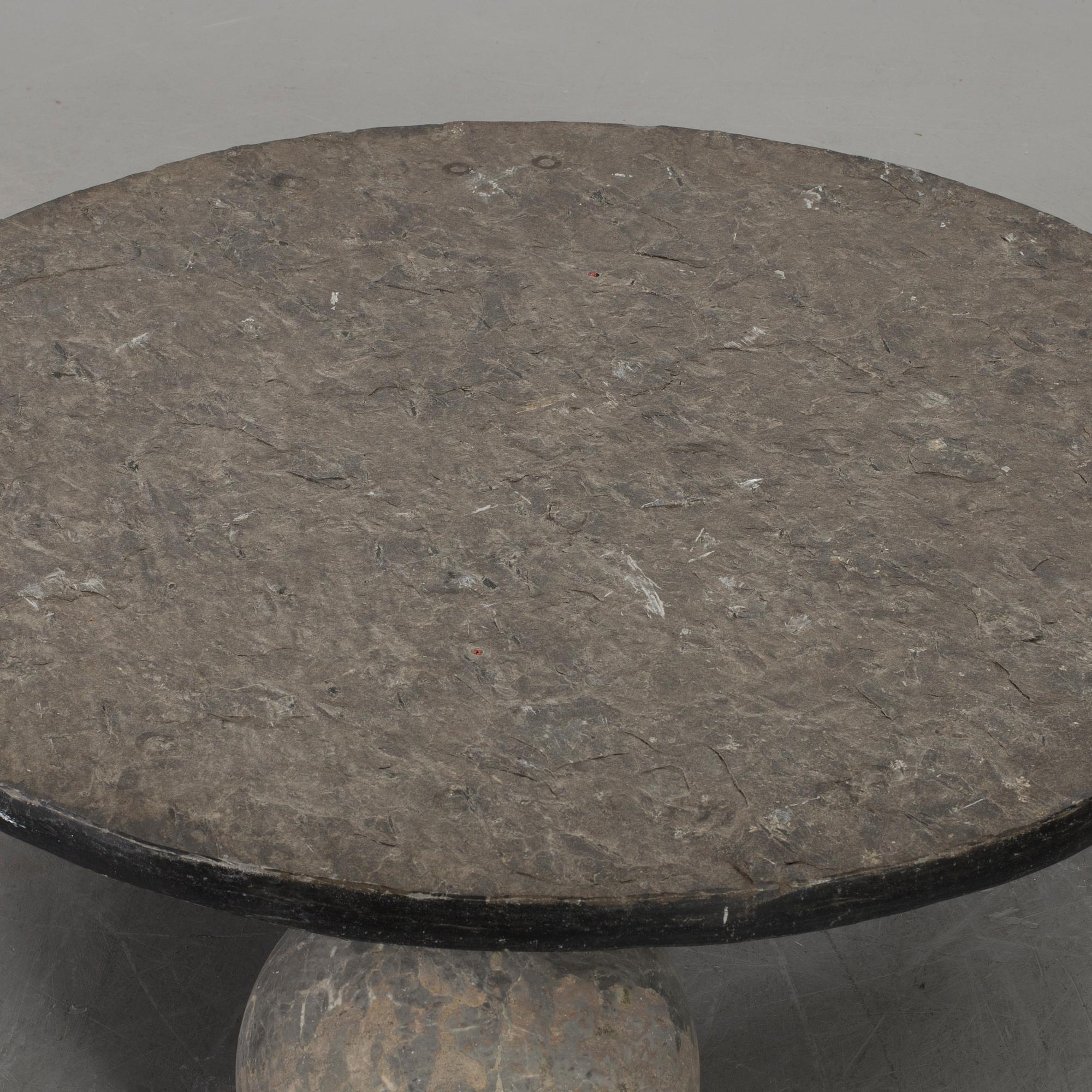 A 20th century stone sofa table.