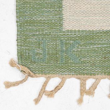 Karin Jönsson a carpet c 310 x 203 cm signed JK.