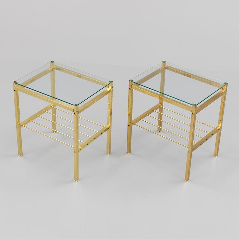 A pair of brass and glass tables, second half of the 20th century.