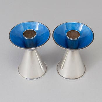 A pair of sterlingsilver candleholders, WA Bolin, Stockholm 1967. Weight ca 311 grams.