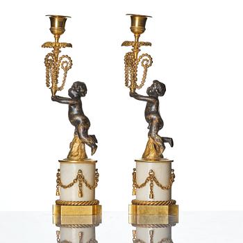 A pair of presumably German Louis XVI candlesticks, circa 1800.