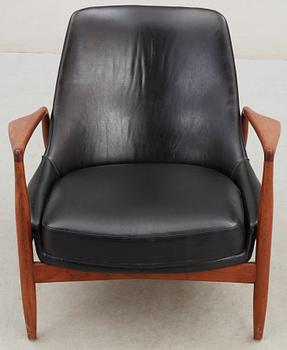 An Ib Kofod Larsen black leather and teak easy chair 'The Seal' by OPE, Sweden 1950-60's.