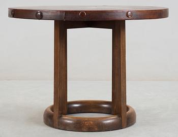 An Axel Einar Hjorth 'Funkis' leather and stained wood table, Nordiska Kompaniet ca 1930.