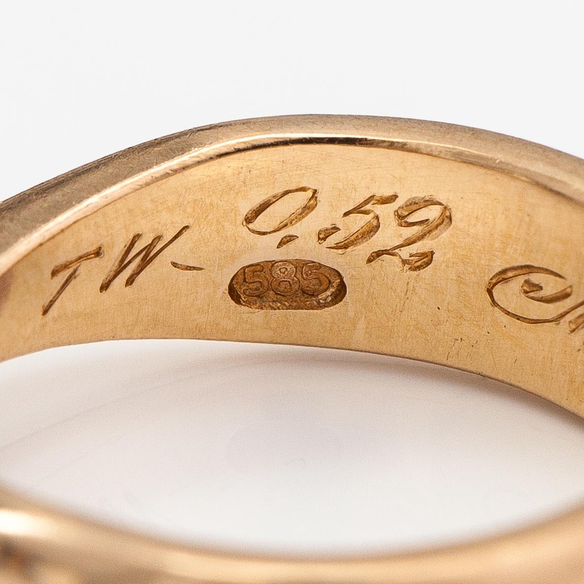 Sormus, 14K kultaa ja timantti n. 0.52 ct kaiverruksen mukaan.