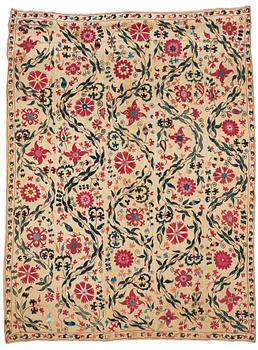 277. An embroidery, an antique suzani, Ura Tube or the Ferghana valley, ca 250,5-253,5 x 185,5-191,5 cm.