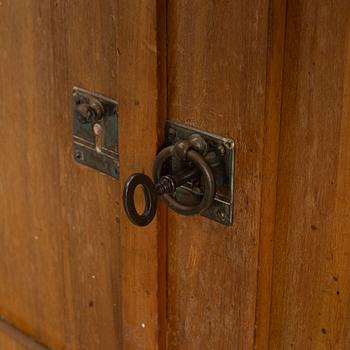 A cabinet, circa 1900.