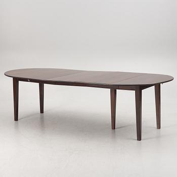 A hardwood dining table, bought at Newport, 21st century.