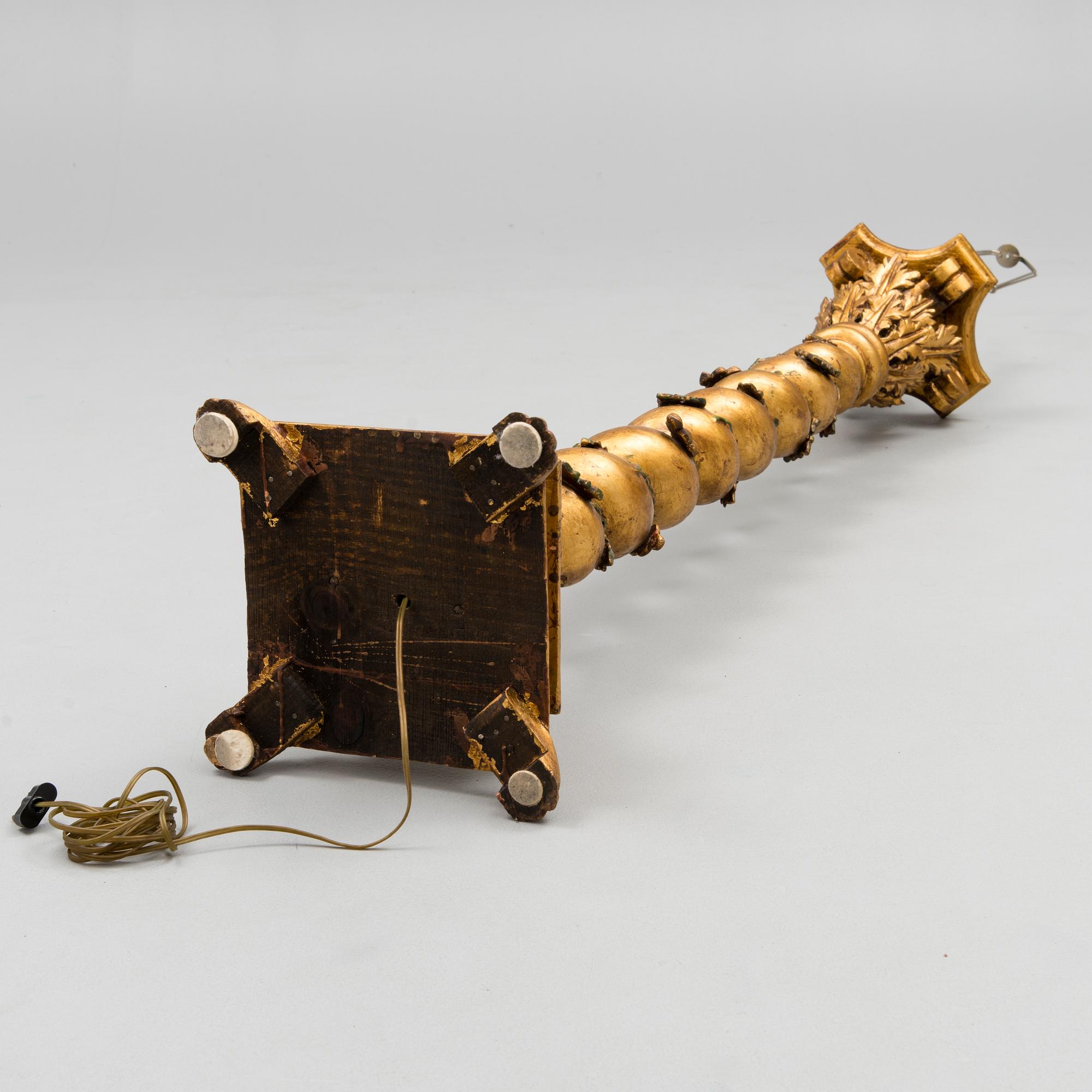 A Baroque style 1920s standard lamp.