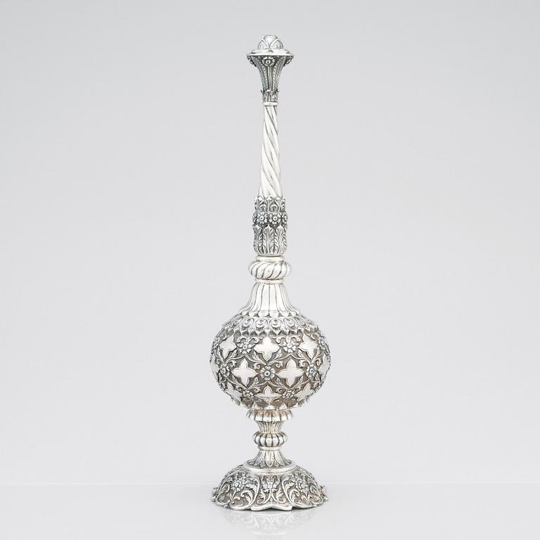 An 1880's british Raj repoussé silver rosewater sprinkler by Oomersi Mawji & Sons.