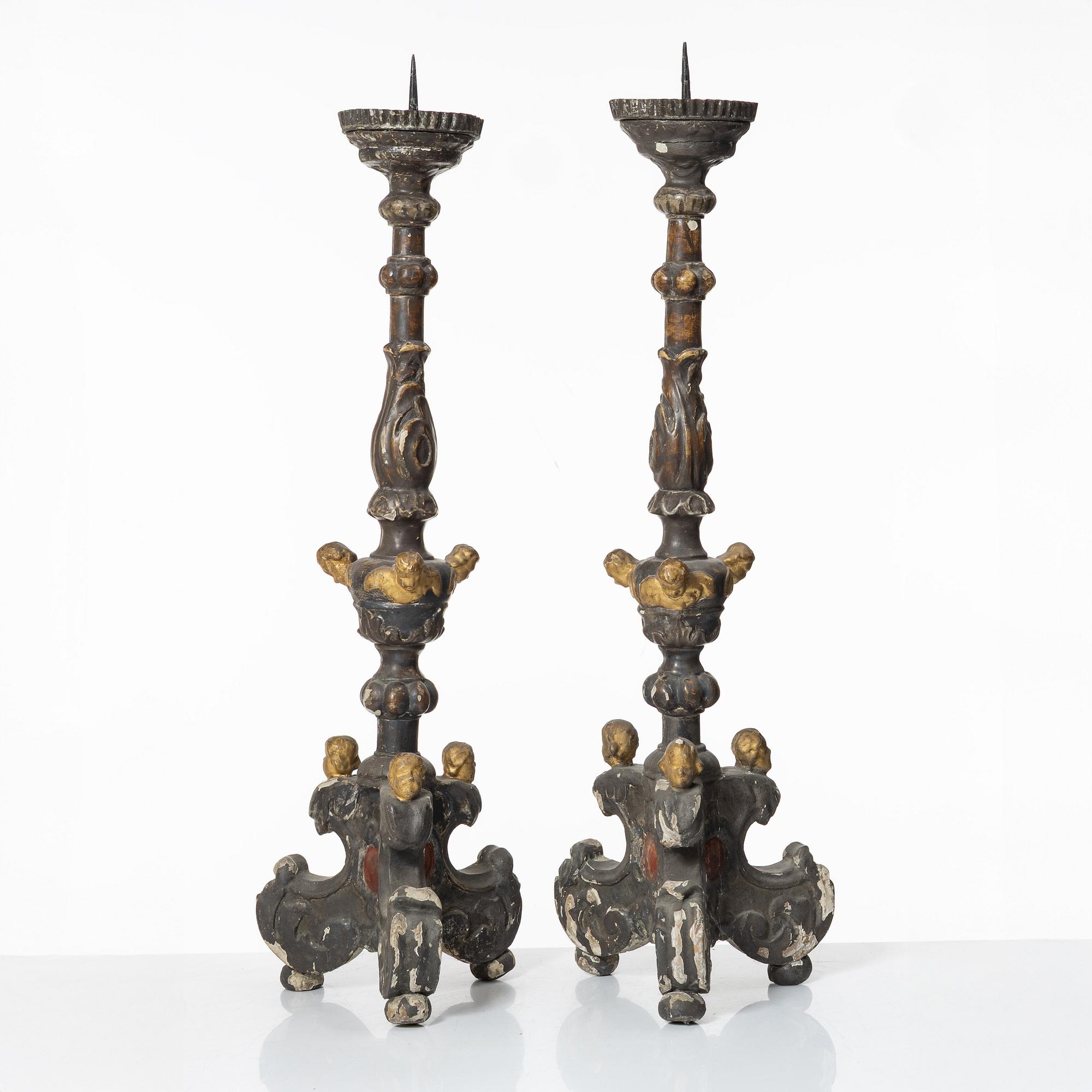 A pair of Baroque style candleholders, 19th Century.