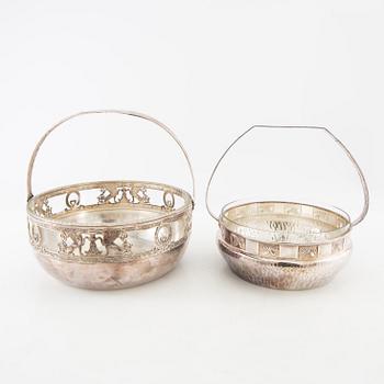 Two henkelskålar in silver-plated metal from the early 20th century, one marked Wurtembergische Metalwarenfabrik, Art Nouveau.