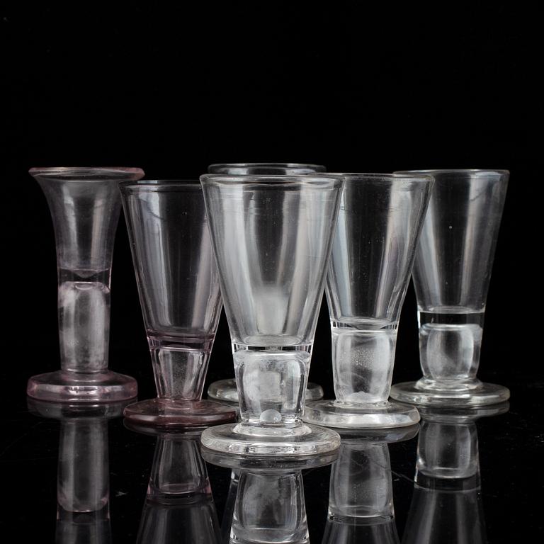 Six similar 18th century wine glasses.