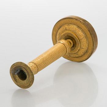 An early 19th century French Empire candlestick.