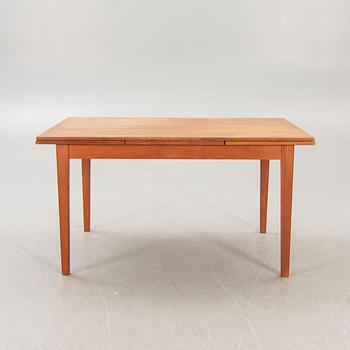 A Danish 1960s teak dining table.