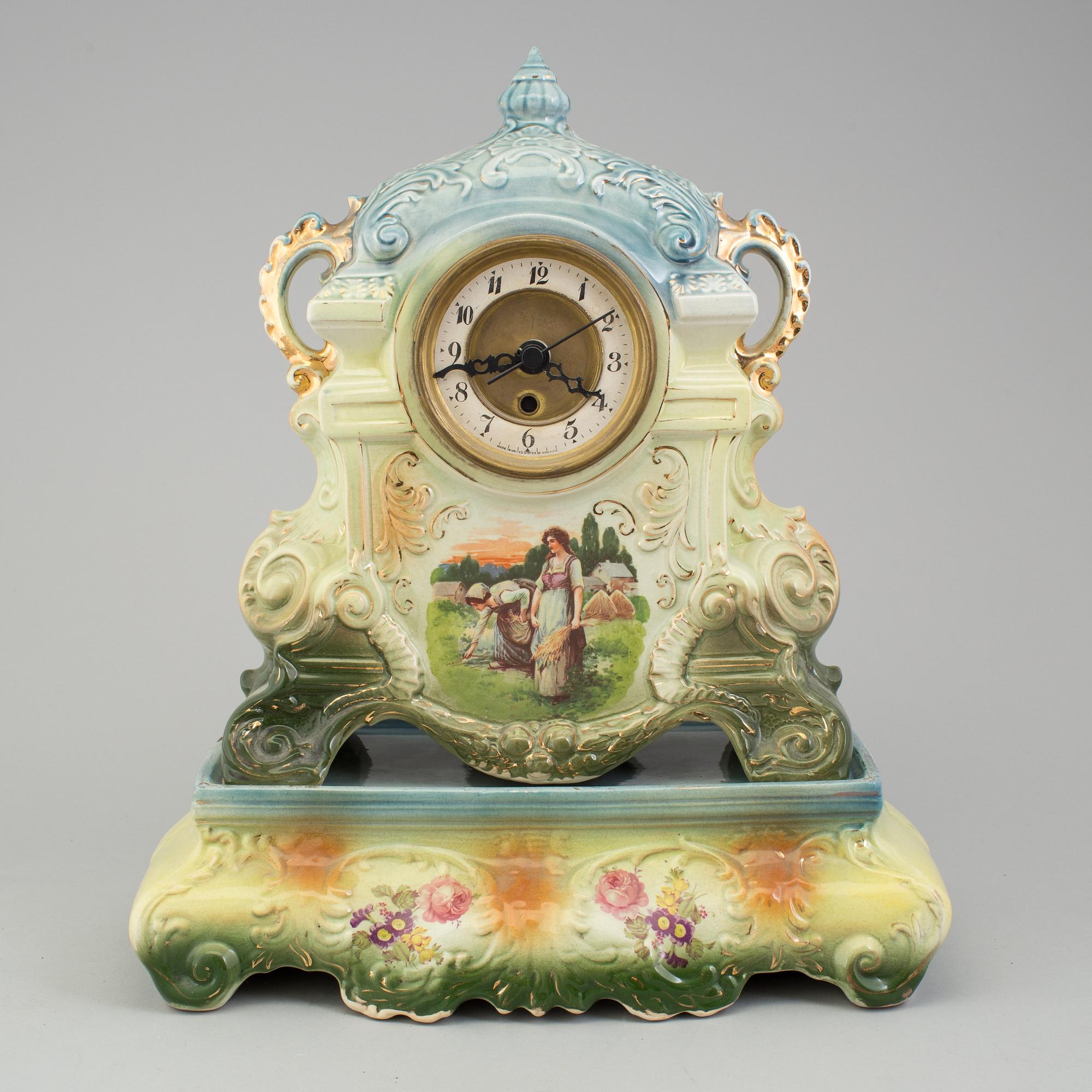 A creamware mantle clock, circa 1900.