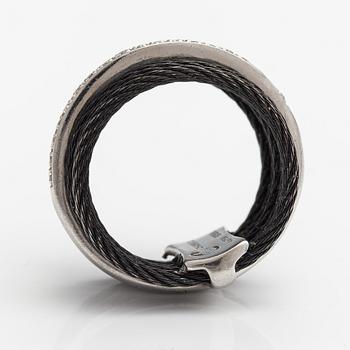 An 18K white gold and steel ring with diamonds ca. 0.095 ct in total. Charriol.