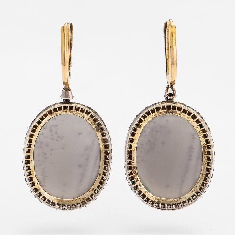 A pair of 18K gold and silver earrings with moonstones and diamonds ca. 1.68 ct in total.