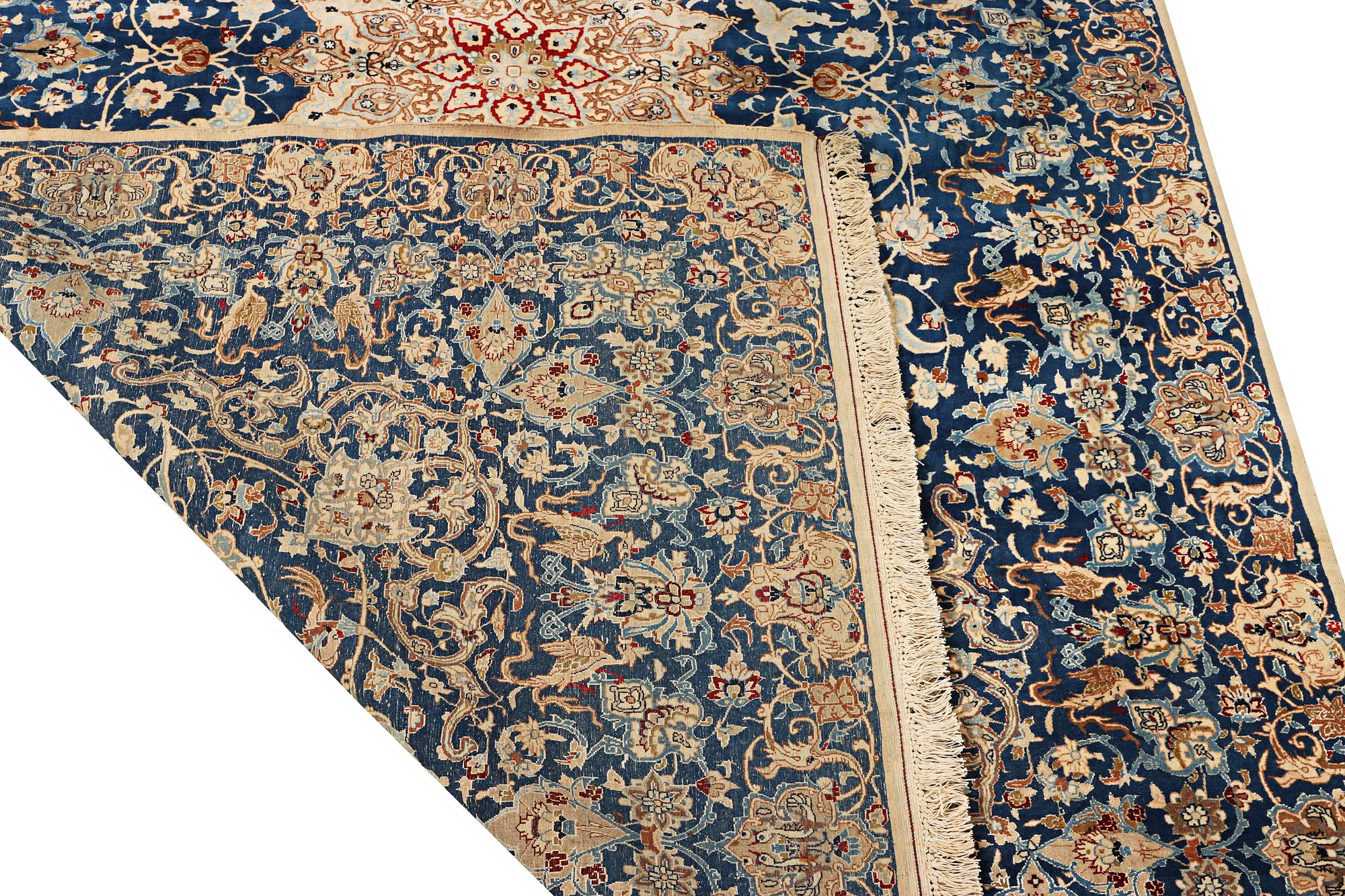 A part silk Nain carpet, 6 LA, c. 250 x 152 cm.