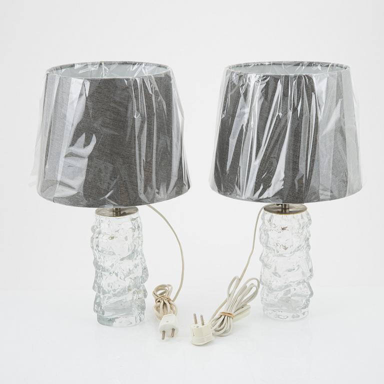 A pair of glass table lamps from Reijmyre, later part of the 20th Century.