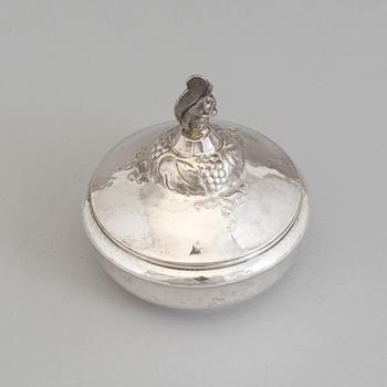 A Swedish Art Nouveau lidded silver box topped with a chipmunk, maker's mark Carl Sandberg, Ystad, 1919.