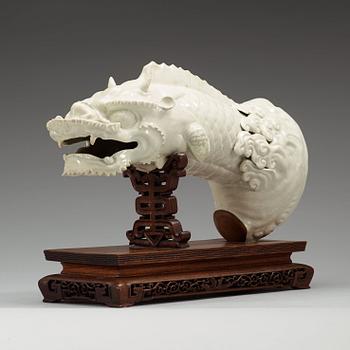 A blanc de chine figure of a dragonfish, Qing dynasty, presumably 18th Century.
