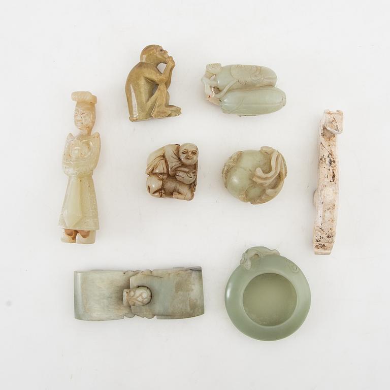 Figurines, belt buckles etc. China.